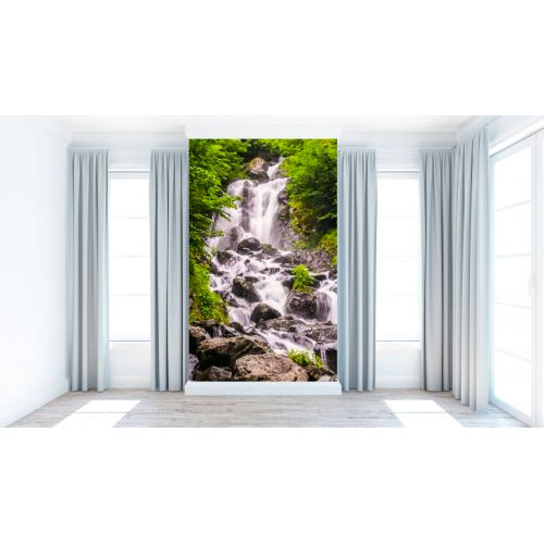 Beautiful waterfall in green forest in jungle